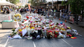 Sea of tributes shows shaken city's grief