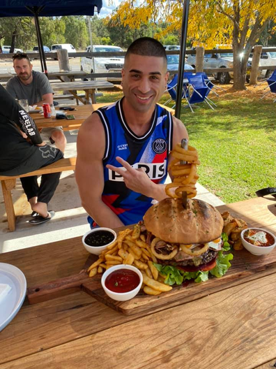 Baulkham Hills man wins burger challenge at Kitchener Hotel