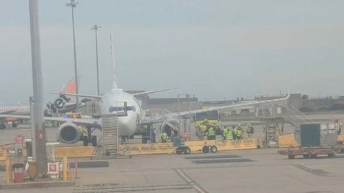 A vape has caught fire on a flight from Brisbane to Melbourne, causing a mid-air call for help.