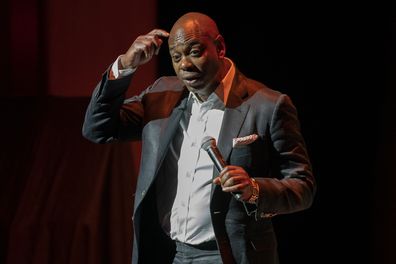 Dave Chappelle performs during a theater dedication ceremony honoring the comedian and actor, and to raise funds to support Duke Ellington School of the Arts in Washington, Monday, June. 20, 2022 
