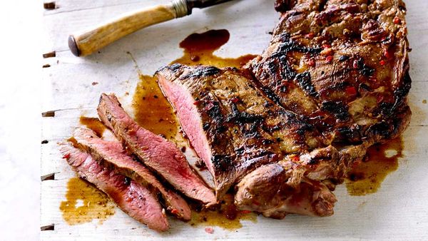 Barbecued butterflied lamb leg with chilli vegetable salad