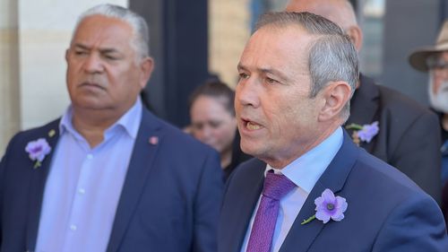 Roger Cook announcing the start of a Stolen Generations redress scheme.