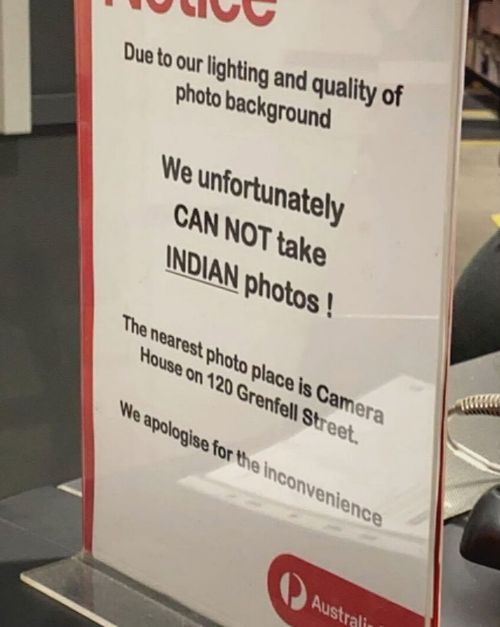 "Due to our lighting and quality of photo background, we unfortunately can not take Indian photos," the sign said.﻿