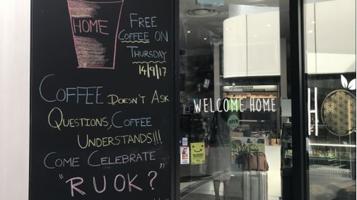 The free coffees were handed out to raise awareness about 'RU OK? Day'. (Sean Davidson / 9NEWS)