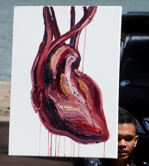 The bleeding heart was signed by all nine of the artist’s death row inmates, including Mary Jane Fiesta Veloso, who was granted an eleventh-hour reprieve and narrowly avoided the firing squad. (AAP) 