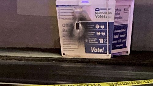 This image released by the Portland Police Bureau shows a ballot box after an incendiary device was discovered inside, in Portland, Ore., Monday, Oct. 28, 2024. (Portland Police Bureau via AP)