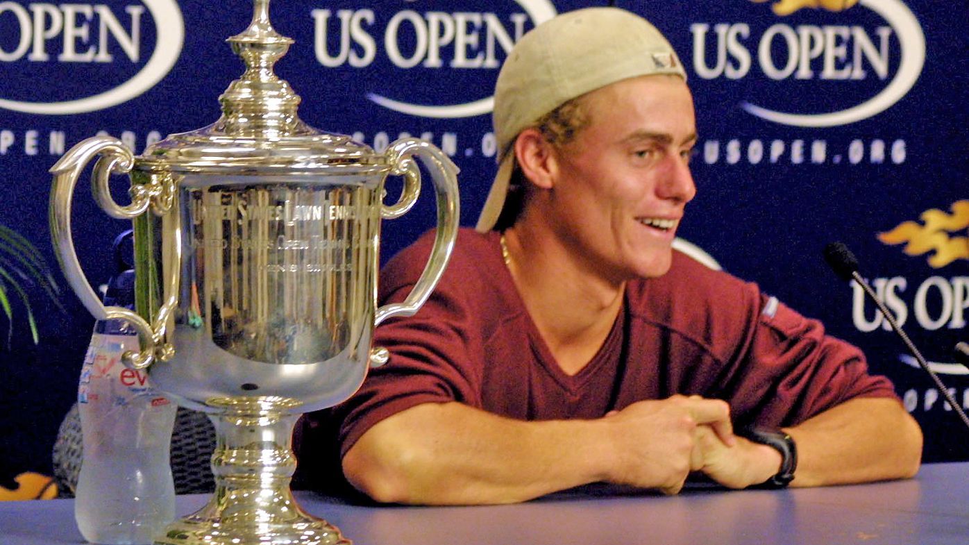  Lleyton Hewitt shares a laugh with the press, with the US Open Trophy