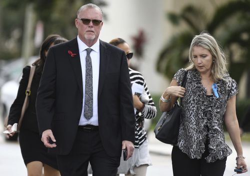 Marjory Stoneman Douglas Principal Ty Thompson leaves the funeral for Carmen Schentrup. (AAP)