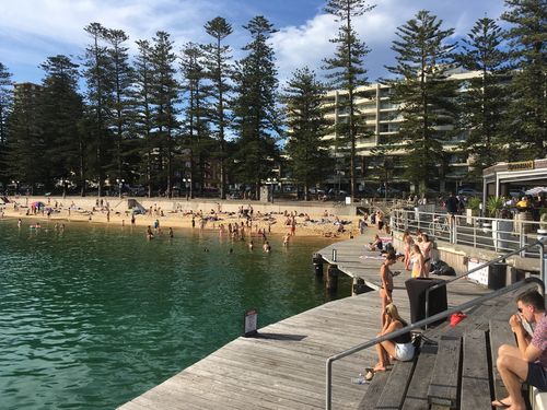 Locals in Manly cooled down at the wharf while temperatures stayed above 30 degrees even after 5pm. 