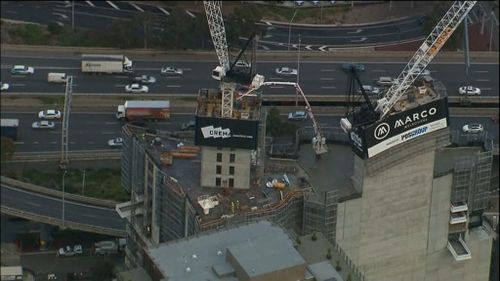 One man injured in Melbourne CBD crane collapse accident