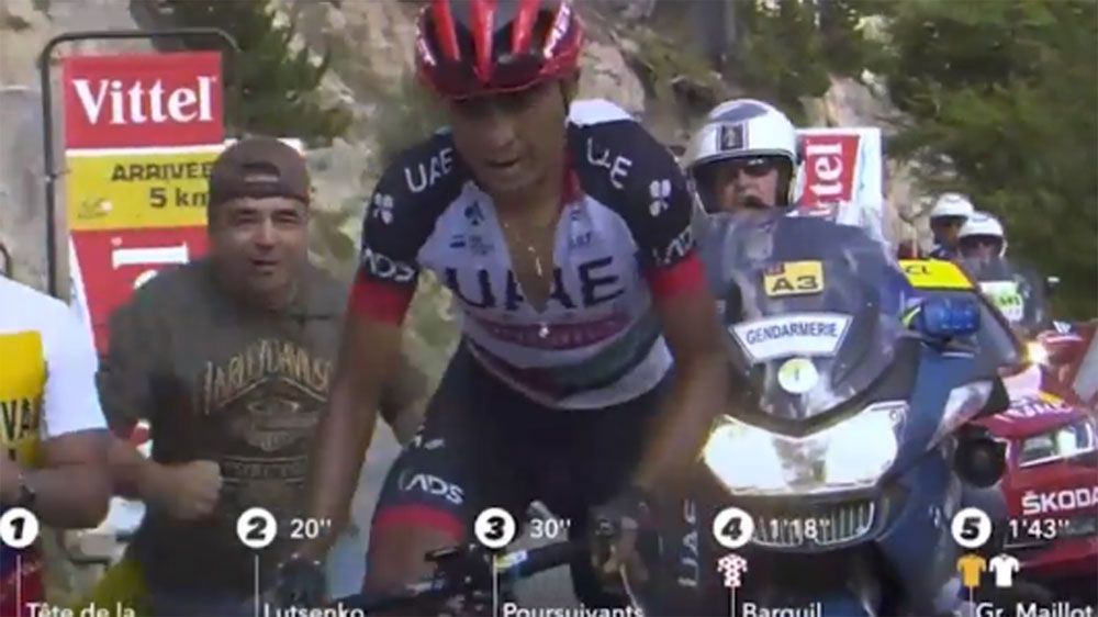 Tour de France: Cop on motorbike bumps fan into gutter as Froome eyes main rival Uran, Barguil wins on Izoard