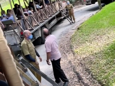 Disney Animal Kingdom staff set up ladders to evacuate park visitors.