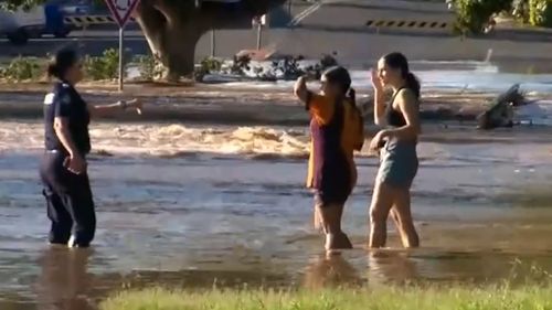 A police officer and bystander then came to her aid, helping her out of the water.