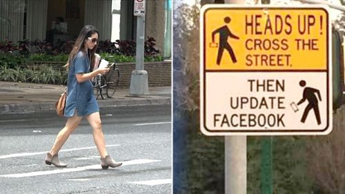 Pedestrians caught texting while using a road crossing could be slapped with fines of up to $650. (9NEWS)