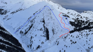 This image is an overview of the accident site. The red line marks the general path of the group, down the slope and then down the gully. 