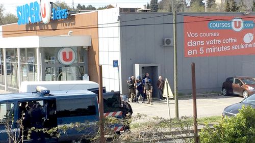 An image posted on Twitter appears to show police at the Super U supermarket in Trebes, in southern France. (Twitter)