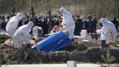 Bodies of coronavirus casualties are buried outside of St Petersburg, Russia.