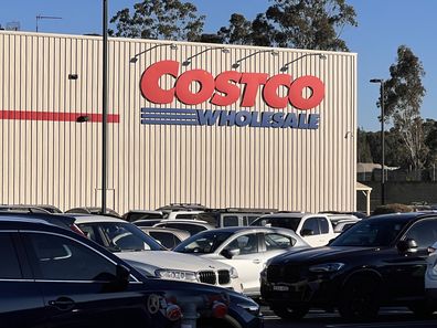 costco signage exterior and instant rebate meaning