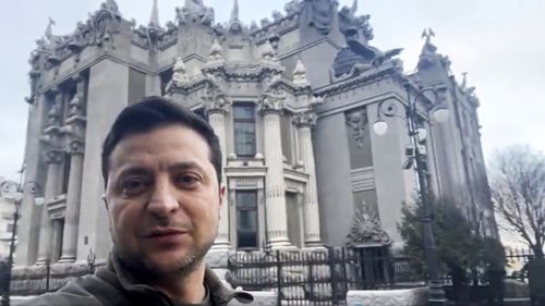 Ukrainian President Volodymyr Zelenskyy speaks to the nation via his phone in the centre of Kyiv, Ukraine.