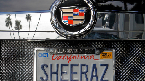 An SUV with a personalised license plate is seen in Beverly Hills, Calif. A federal judge said Tuesday, November 24, 2020, that California cant ban vanity license plates it considers offensive to good taste and decency, because that violates freedom of speech. (AP Photo/Damian Dovarganes, File)