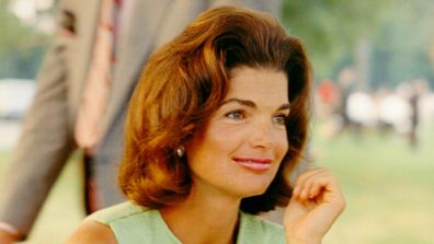 CIRCA 1960s:  Former First Lady Jacqueline Kennedy enjoys herself at a picnic circa the 1960s.  