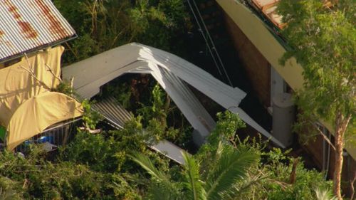 This sheet of corrugated iron was no match for the destructive winds. 