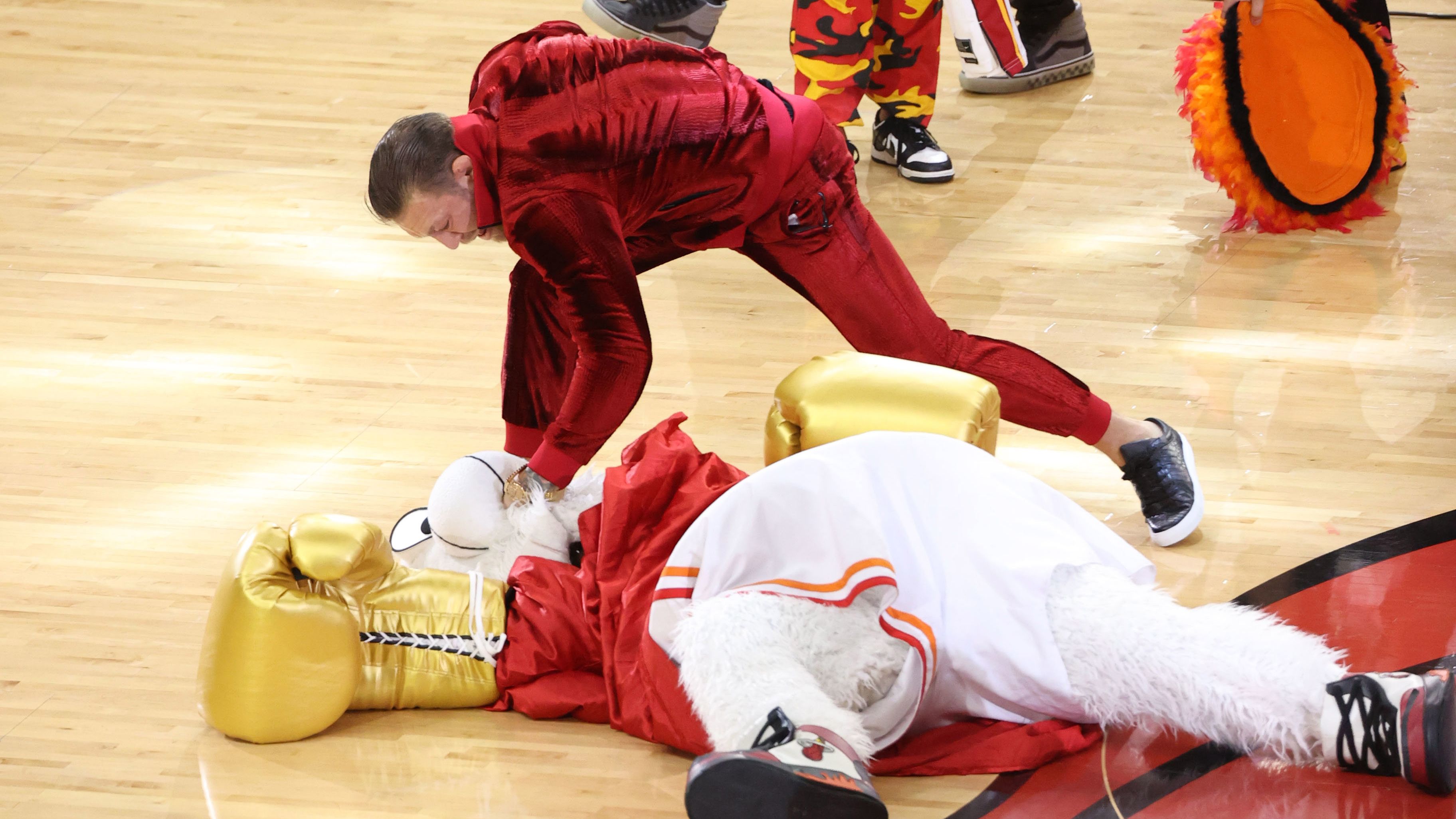 Connor McGregor and Mascot Burnie of the Miami Heat got into a tussle.