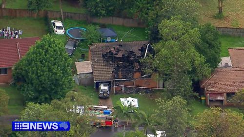 Neighbours heard explosions and screams as flames engulfed the home north of Brisbane in minutes.