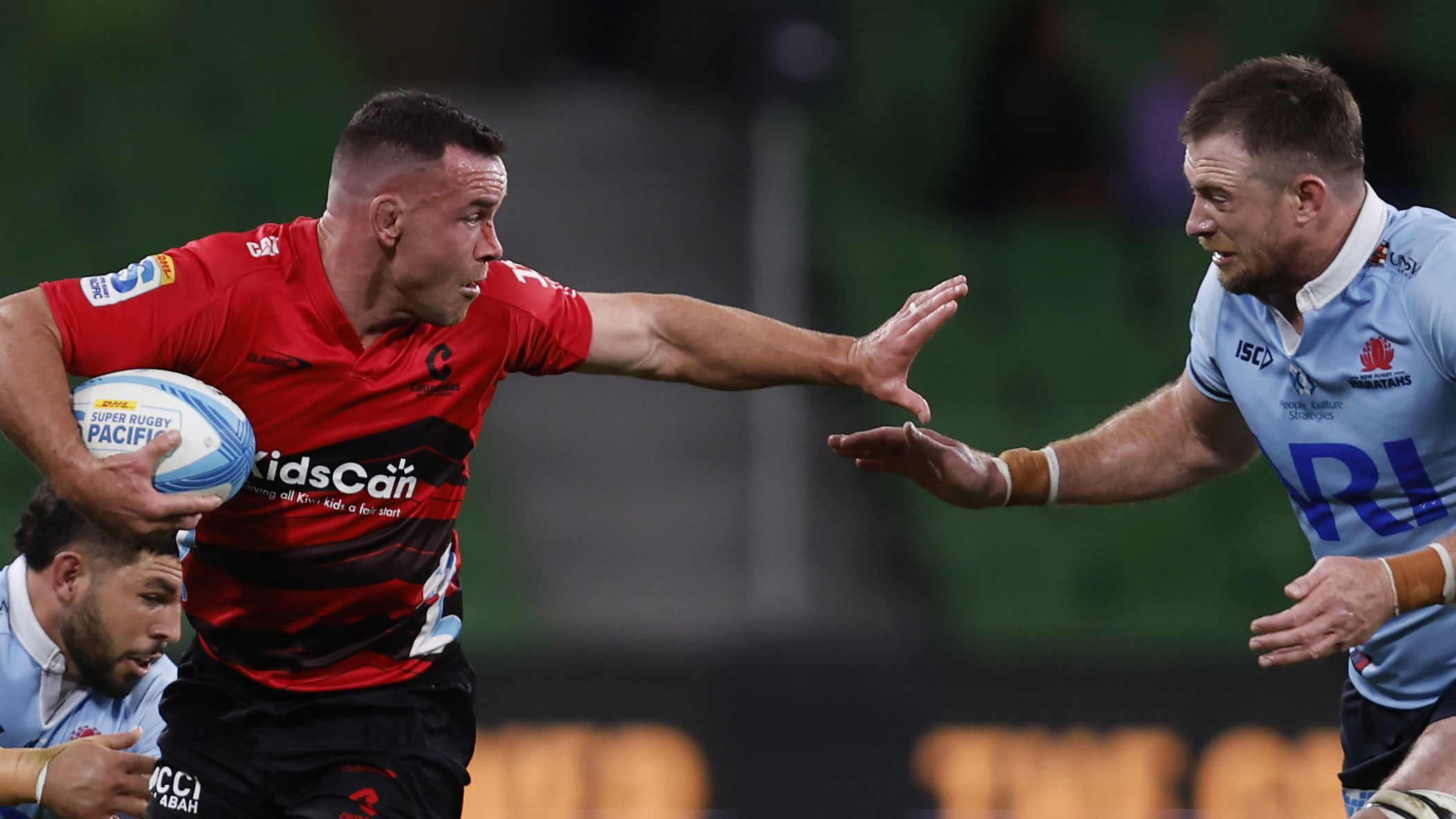Ryan Crotty runs with the ball during the round two Super Rugby Pacific match between Crusaders and NSW Waratahs.