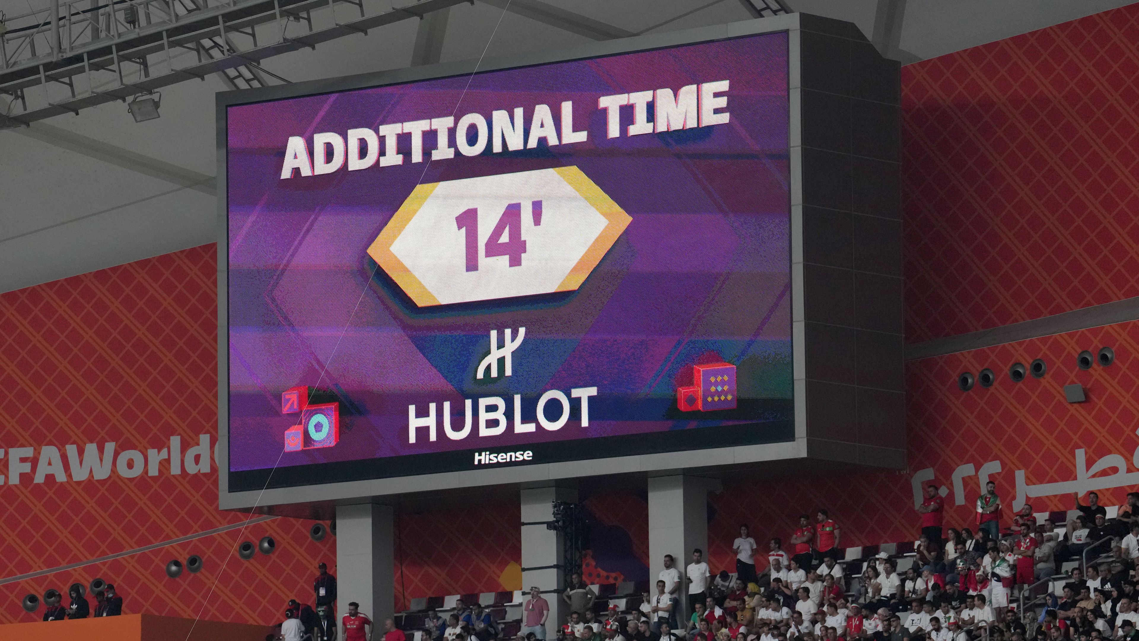 The big screen displays fourteen minutes of added time at the end of the first half during the FIFA World Cup Group B match at the Khalifa International Stadium in Doha, Qatar. Picture date: Monday November 21, 2022. (Photo by Martin Rickett/PA Images via Getty Images)
