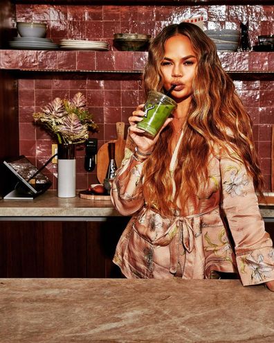 Chrissy Teigen, drinking smoothie, photoshoot 