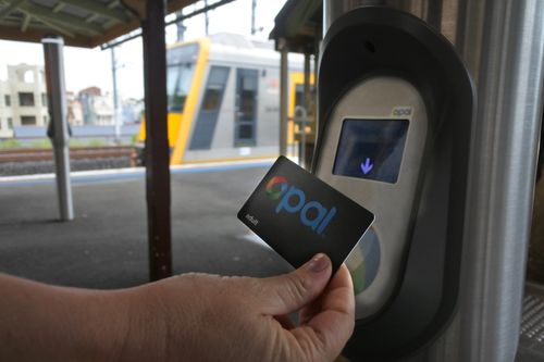 SYDNEY - FEB 21 2019:Opal Card User. Opal is a contact less smart card ticketing system for public transport services in the greater Sydney area of New South Wales, Australia.