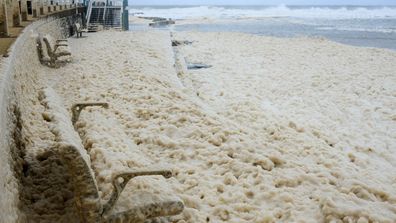 Newcastle beach foam wild weather 