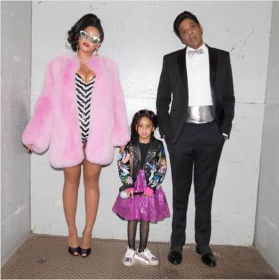 Beyonce as Barbie , Jay-Z and Blue Ivy in a sparkly tutu and moto jacket, 2016