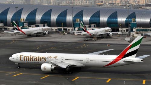An Emirates plane taxis to a gate at Dubai International Airport at Dubai International Airport in Dubai, United Arab Emirates. (AP)