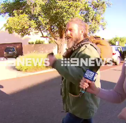 Cousins, who is sporting long hair and beard, refused to answer any questions about his decision to quit. (9NEWS)