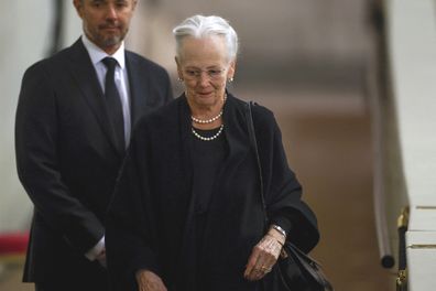 Denmark's Queen Margrethe pays her respect to the coffin of Britain's Queen Elizabeth, following her death, during her lying-in-state at Westminster Hall, in London, Sunday Sept. 18, 2022