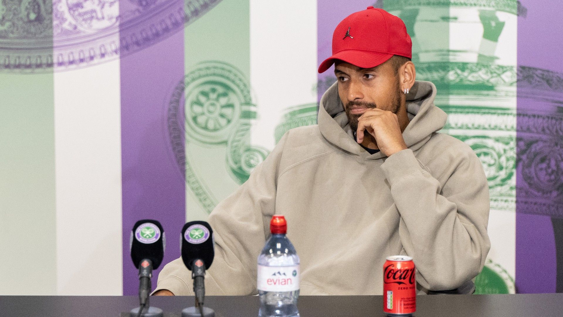 Nick Kyrgios grilled by reporter over wardrobe choice after huge fourth round win