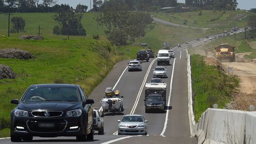 Traffic moves along the Princes Highway near Jaspers Brush in the Shoalhaven area, NSW.