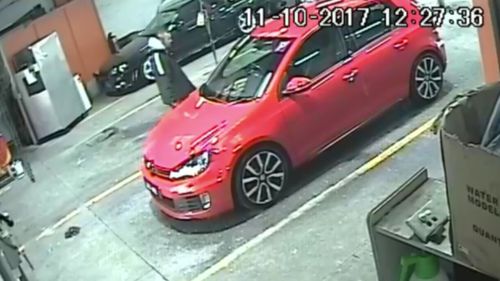 CCTV showed the offender boldly stealing the Golf from the car wash. (9NEWS)