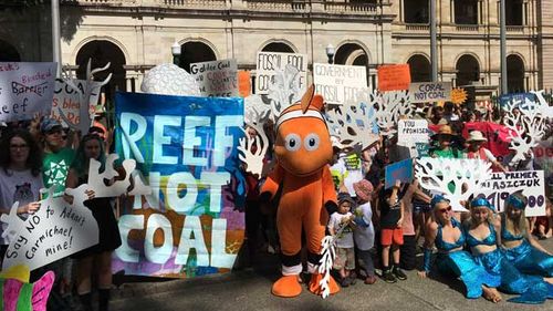 Protesters urge Queensland government to stop $22b mega-mine