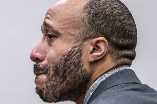 Defendant Darrell Brooks fights back tears as he makes his opening statement to the jury during his trial in a Waukesha County Circuit Court in Waukesha, Wisconsin, on Thursday, Oct. 20, 2022. 