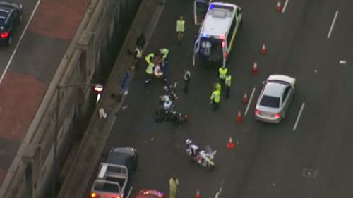 An accident involving a car and a motorcycle on the Sydney Harbour Bridge has caused massive delays for Sydney commuters. (9NEWS)