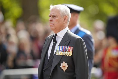 Britain's Prince Andrew follows the coffin of Queen Elizabeth II during a procession from Buckingham Palace to Westminster Hall in London, Wednesday, Sept. 14, 2022. The Queen will lie in state in Westminster Hall for four full days before her funeral on Monday Sept. 19. (AP Photo/Martin Meissner, Pool)