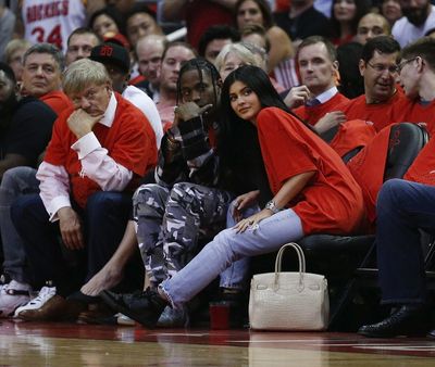 Travis Scott and Kylie Jenner make their first public appearance together at the NBA Playoffs in Texas, April 2017