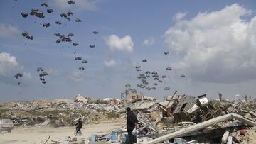 Humanitarian aid is airdropped to Palestinians over Gaza City, Gaza Strip, Monday, March 25, 2024.