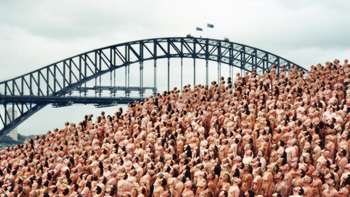 Spencer Tunick has conducted four installations in Australia. Around 5,500 turned up on a cold morning in March 2010 to pose in front of the Sydney Opera House.