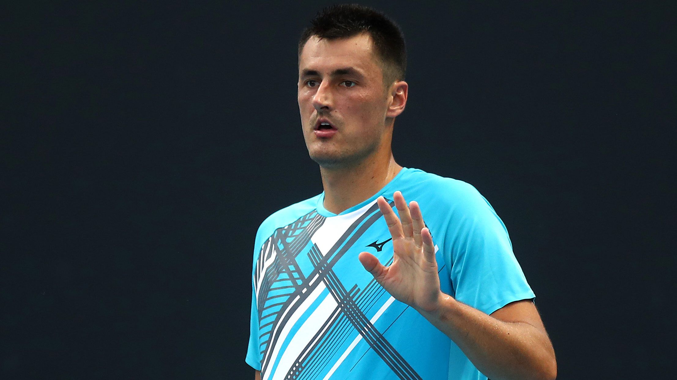 Bernard Tomic in action in the first round of the Australian Open.