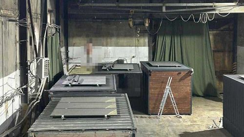 This handout photo from the Ukrainian Security Service shows wooden sheds in an industrial facility. (Note: The location and date of this image has not been independently verified and a portion of this image was blurred by the source.)