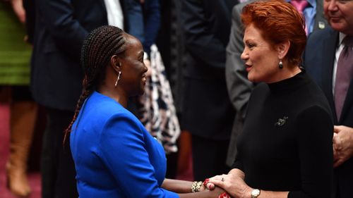 Senator Gichuhi was embraced by Senator Pauline Hanson. (AAP)